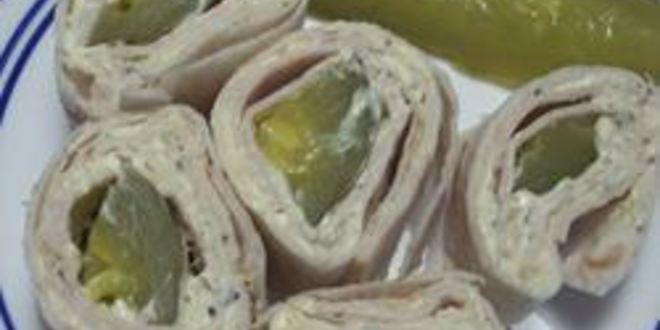 Рецепт рулетиков из лаваша с маринованными огурцами и ветчиной