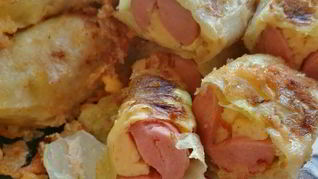 Рецепт Сосисок с сыром в капусте