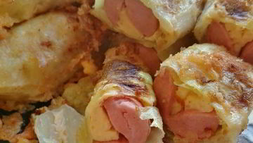 Рецепт Сосисок с сыром в капусте